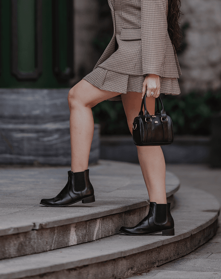 “True luxury of Chelsea boots with the grace of the Princess Dome Bag offers the strength”